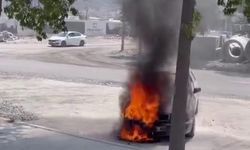 Yanan otomobilin imdadına beton mikseri yetişti