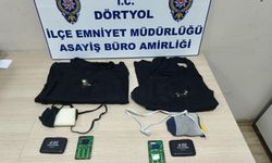 Ehliyet sınavına kopya düzeneği ile giren iki kardeş yakalandı