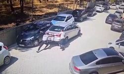El freni çekilmeyen otomobil yokuş aşağı giderken güvenlik görevlileri durdurdu