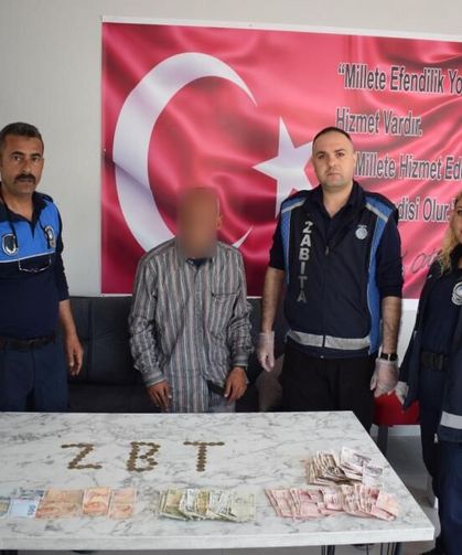 Dilencinin üzerinden 2 bin TL para çıktı