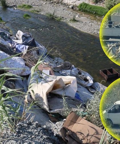 Dereye kamyon dolusu atık malzeme döktüler