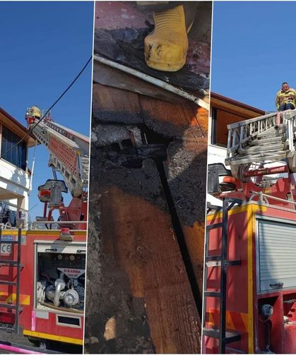 Çatı yangını binaya sıçramadan söndürüldü