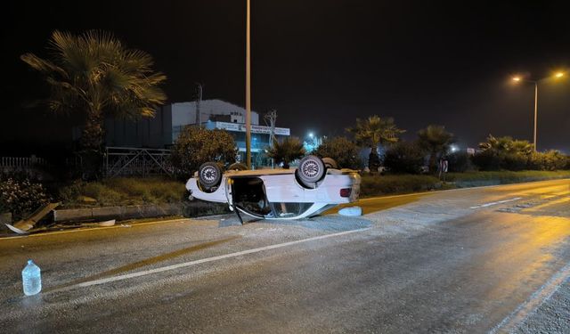 Takla atarak, ters dönen otomobilin sürücüsü yaralandı