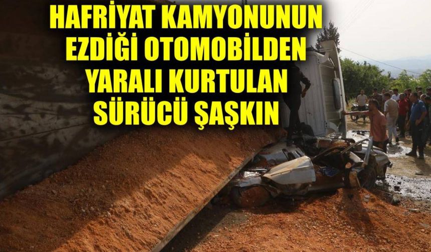Hafriyat kamyonunun ezdiği otomobilden yaralı kurtulan sürücü şaşkın