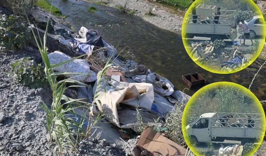 Dereye kamyon dolusu atık malzeme döktüler